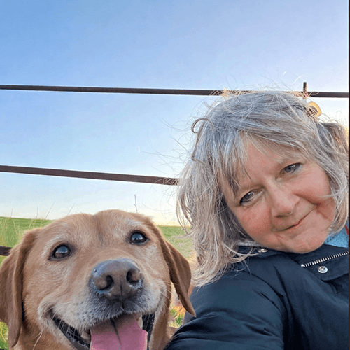 Bella Colby with Bella the fox-red Labrador, the inspiration behind the Bella Colby pen name